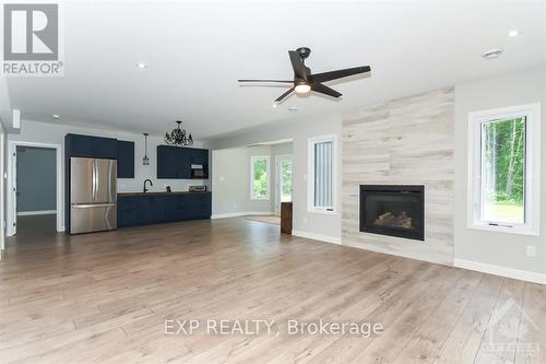 1579 Rollin Road, Clarence-Rockland, ON - Indoor Photo Showing Living Room With Fireplace