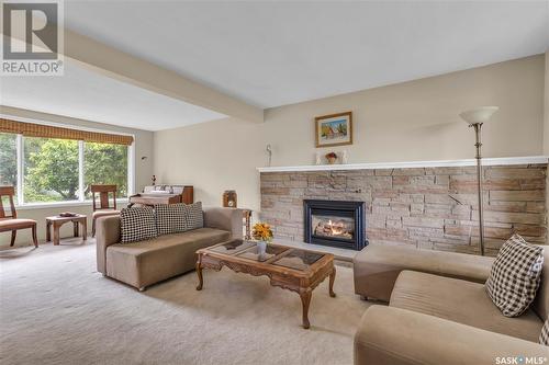 1321 Conn Avenue, Saskatoon, SK - Indoor Photo Showing Living Room With Fireplace