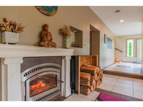 4621 Carlson East Road, Nelson, BC - Indoor With Fireplace