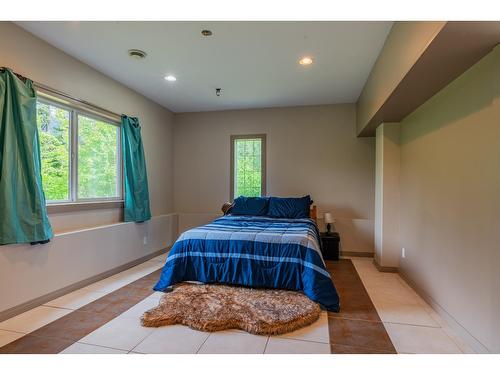 4621 Carlson East Road, Nelson, BC - Indoor Photo Showing Bedroom