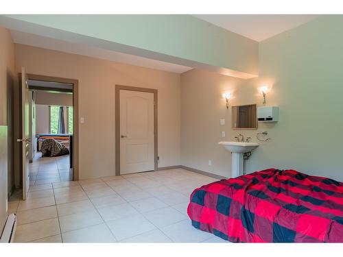 4621 Carlson East Road, Nelson, BC - Indoor Photo Showing Bedroom