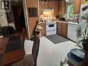 719 9Th  Nw Avenue, Nakusp, BC  - Indoor Photo Showing Kitchen With Double Sink 