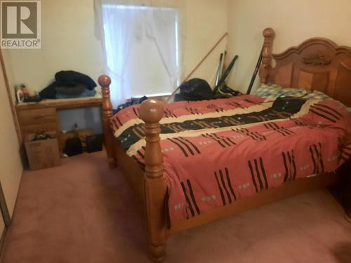 719 9Th  Nw Avenue, Nakusp, BC - Indoor Photo Showing Bedroom