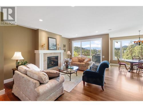 1877 Begbie Road, Kelowna, BC - Indoor Photo Showing Living Room With Fireplace