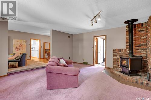 865 Algoma Avenue, Moose Jaw, SK - Indoor Photo Showing Living Room With Fireplace