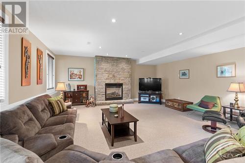 6697 Suncrest Drive, Greely, ON - Indoor Photo Showing Living Room With Fireplace