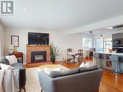 6883 Hammond Street, Powell River, BC - Indoor Photo Showing Living Room With Fireplace