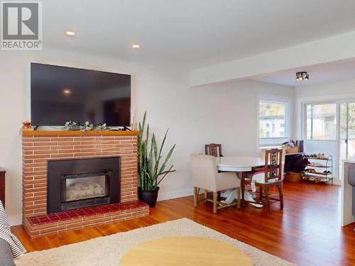 6883 Hammond Street, Powell River, BC - Indoor Photo Showing Living Room With Fireplace