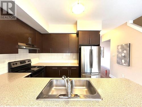 18 - 1401 Plains Road E, Burlington, ON - Indoor Photo Showing Kitchen With Double Sink