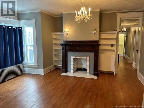 100-102 Alma Street, Moncton, NB - Indoor Photo Showing Living Room With Fireplace