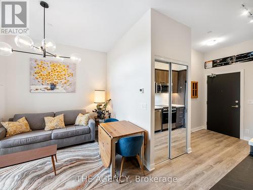 101 - 1 Neighbourhood Lane, Toronto, ON - Indoor Photo Showing Living Room