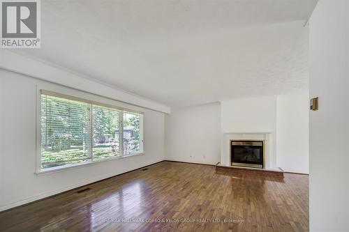 3 Evelyn Street, Innisfil, ON - Indoor Photo Showing Living Room With Fireplace