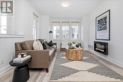 7 Julia Crescent, Midland, ON - Indoor Photo Showing Living Room With Fireplace