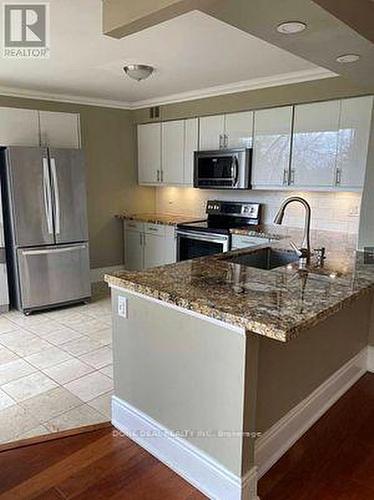 207 - 50 Eglinton Avenue W, Mississauga, ON - Indoor Photo Showing Kitchen With Upgraded Kitchen
