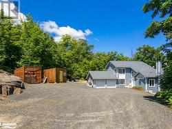 Wood Shed and Double Garage and Storage Shed - 