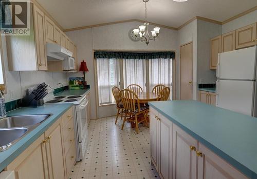 2591 Settlement  Road, Lister, BC - Indoor Photo Showing Kitchen With Double Sink