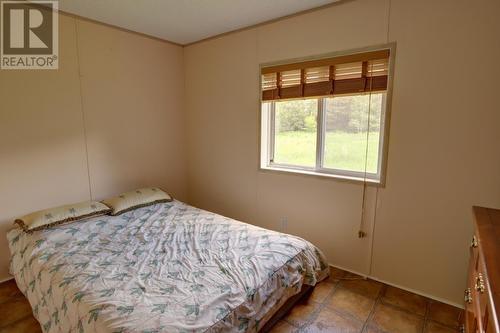 2591 Settlement  Road, Lister, BC - Indoor Photo Showing Bedroom