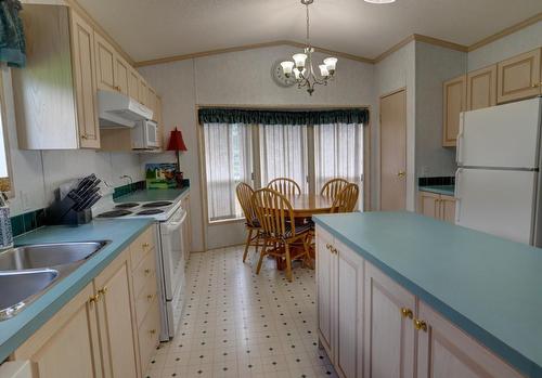 2591 Settlement Road, Lister, BC - Indoor Photo Showing Kitchen With Double Sink