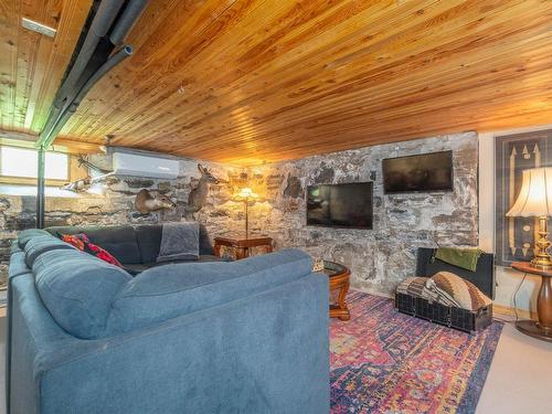 Family room - 127 Rue Carrière, Lachute, QC -  With Fireplace With Exterior