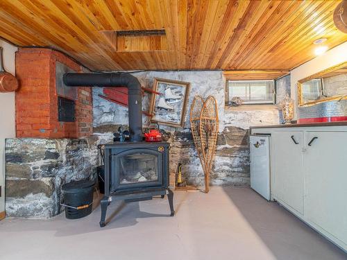 Family room - 127 Rue Carrière, Lachute, QC - Indoor Photo Showing Other Room With Fireplace