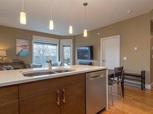 205-2589 Penrhyn St, Saanich, BC - Indoor Photo Showing Kitchen With Double Sink