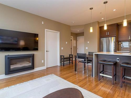 205-2589 Penrhyn St, Saanich, BC - Indoor With Fireplace