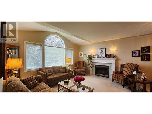 7501 Devito  Drive, Trail, BC - Indoor Photo Showing Living Room With Fireplace