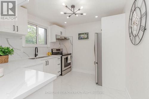 6983 Justine Drive, Mississauga, ON - Indoor Photo Showing Kitchen With Double Sink