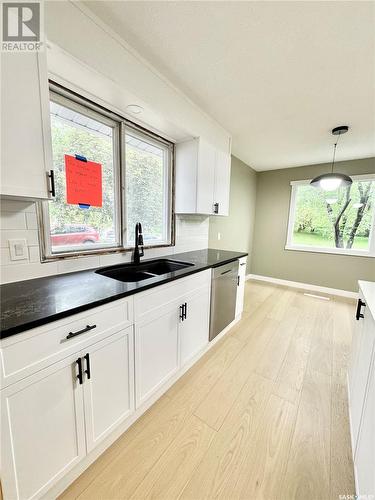 723 22Nd Street E, Prince Albert, SK - Indoor Photo Showing Kitchen With Double Sink