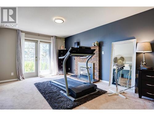 1175 Toovey Road, Kelowna, BC - Indoor Photo Showing Gym Room