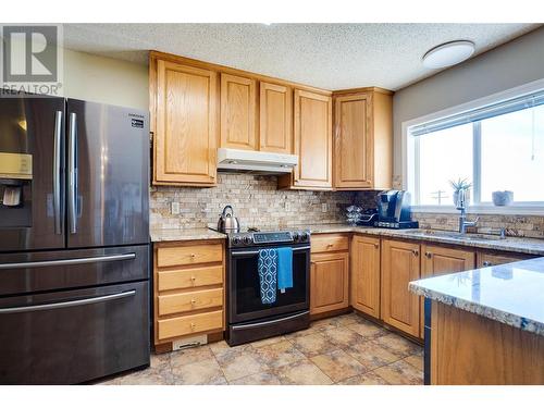 1175 Toovey Road, Kelowna, BC - Indoor Photo Showing Kitchen With Double Sink