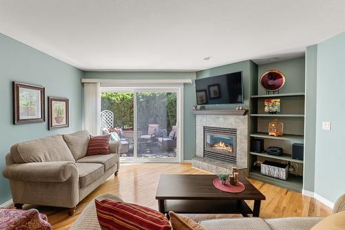 7-1645 Ufton Court, Kelowna, BC - Indoor Photo Showing Living Room With Fireplace