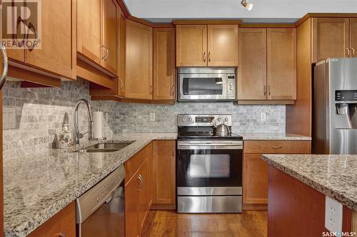 205 2160 Heseltine Road, Regina, SK - Indoor Photo Showing Kitchen With Double Sink With Upgraded Kitchen