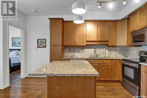 205 2160 Heseltine Road, Regina, SK - Indoor Photo Showing Kitchen With Double Sink