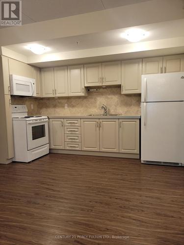 202 - 75 Emma Street, Oshawa, ON - Indoor Photo Showing Kitchen