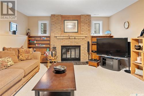 207 Lakeshore Place, Saskatoon, SK - Indoor Photo Showing Living Room With Fireplace