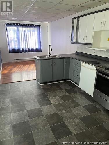 480 Queen Street, Dalhousie, NB - Indoor Photo Showing Kitchen With Double Sink