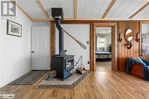 36 15C (Huckleberry) Island, Carling, ON - Indoor Photo Showing Other Room With Fireplace