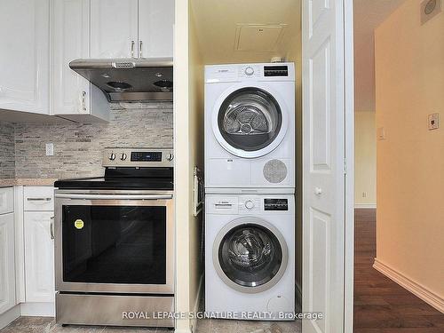 702-10 Tangreen Crt, Toronto, ON - Indoor Photo Showing Laundry Room