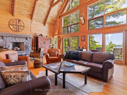 B350 Echo Island, The Archipelago, ON - Indoor Photo Showing Living Room With Fireplace