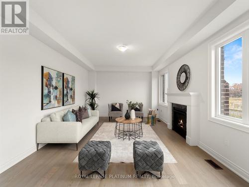 61 Pond View Gate, Hamilton (Waterdown), ON - Indoor Photo Showing Living Room With Fireplace