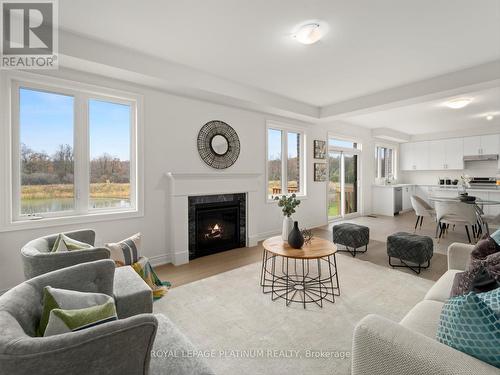 61 Pond View Gate, Hamilton (Waterdown), ON - Indoor Photo Showing Living Room With Fireplace