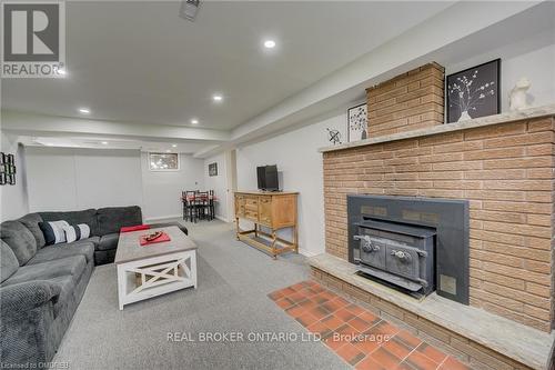 2859 Dominion Road, Fort Erie, ON - Indoor Photo Showing Living Room With Fireplace