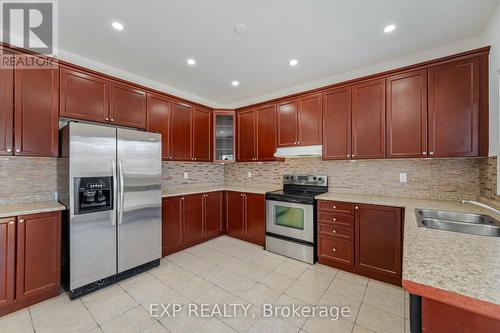 1002 Vickerman Gate, Milton (Coates), ON - Indoor Photo Showing Kitchen With Double Sink