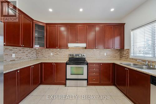 1002 Vickerman Gate, Milton (Coates), ON - Indoor Photo Showing Kitchen With Double Sink