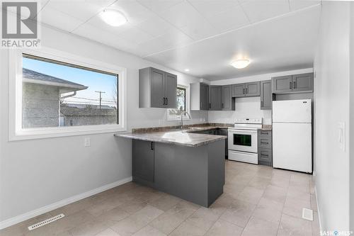 211 3Rd Avenue W, Watrous, SK - Indoor Photo Showing Kitchen With Double Sink