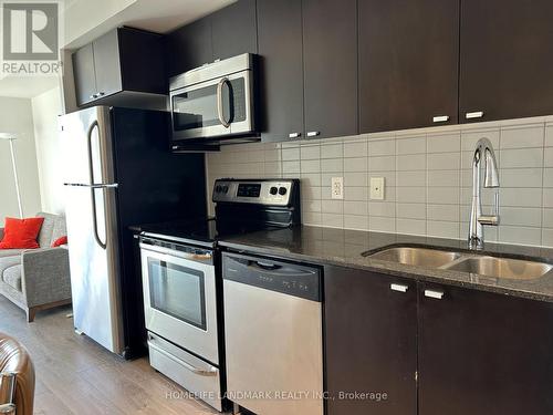 909 - 105 The Queensway, Toronto (High Park-Swansea), ON - Indoor Photo Showing Kitchen With Double Sink