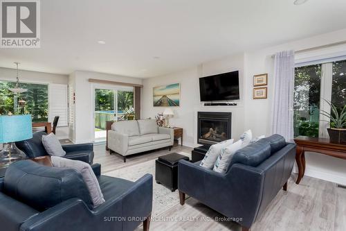 51 Knox Road W, Wasaga Beach, ON - Indoor Photo Showing Living Room With Fireplace