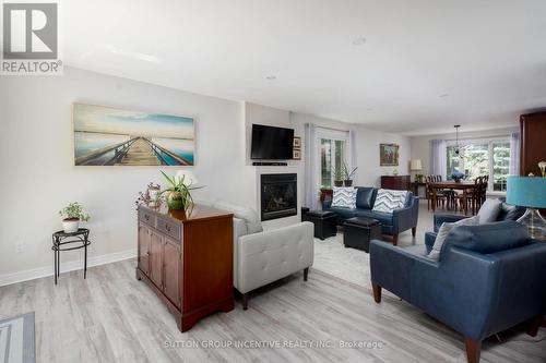 51 Knox Road W, Wasaga Beach, ON - Indoor Photo Showing Living Room With Fireplace