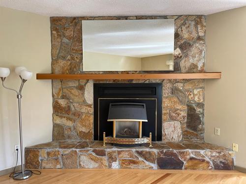1015 Carbonate Street, Nelson, BC - Indoor Photo Showing Living Room With Fireplace